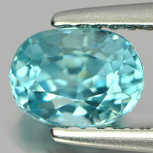 Natural Blue Color Zircon Gemstones 1.19 Ct. Oval Shape 6.5 x 4.8 Mm.: Product ID: 807717070 Product Name: Natural Zircon Weight: 1.19 CT. Size: 6.5 x 4.8 x 3.8 MM. Shape: Oval Color: Blue Clarity:VSI Luster: Good Gems Origin: Cambodia Treatment: Heated Crystal Structure