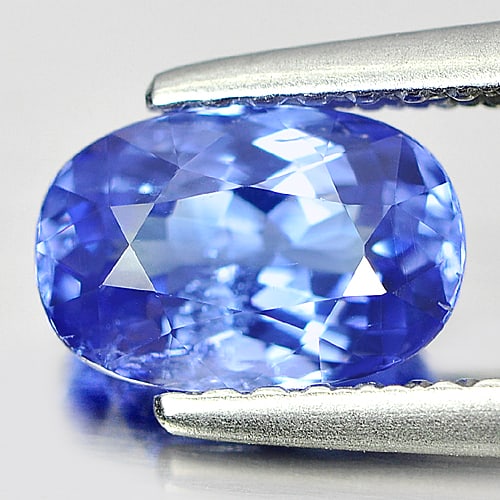 Natural Blue Tanzanite Gemstones 1.06 Ct. Oval Shape 7.4 x 5 Mm.: Product ID: 807004557 Product Name: Natural Tanzanite Weight: 1.06 CT. Size: 7.4 x 5 x 3.7 MM. Shape: Oval Color: Blue Clarity:SI Luster: Very Good Gems Origin: Tanzania Treatment: Heated Crystal Stru