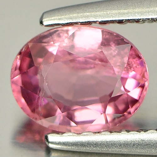 Natural Pink Tourmaline Gemstones 0.79 Ct. Oval Shape 6.4 x 5 Mm.: Product ID: 807238370 Product Name: Natural Tourmaline Weight: 0.79 CT. Size: 6.4 x 5 x 3.5 MM. Shape: Oval Color: Pink Clarity:SI Luster: Good Gems Origin: Nigeria Treatment: Unheated Crystal Structu