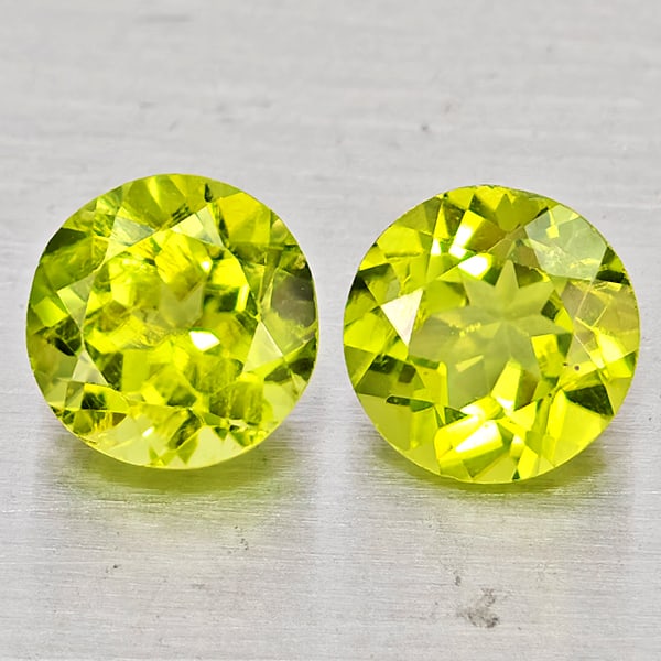 Natural Green Peridot Gemstones 1.87 Ct. 2 Pcs Round Shape 6 Mm.: Product ID: 805317436 Product Name: Natural Rhodolite Weight: 1.87 CT. Size: 6 x 6 x 3.6 MM. Shape: Round Color: Green Clarity:VSI Luster: Good Gems Origin: Pakistan Treatment: Unheated Crystal Struct