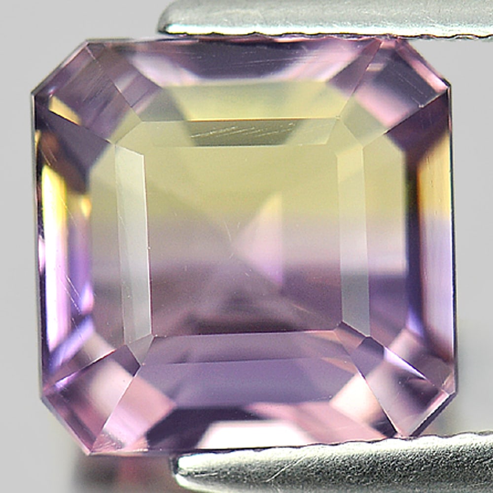 Natural Bi Color Ametrine Gemstones 4.43 Ct. VVS Octagon 9.8 x 9.8 Mm.: Product ID: 800405178 Product Name: Natural Ametrine Weight: 4.43 CT. Size: 9.8 x 9.8 x 6.5 MM. Shape: Octagon Color: Bi Color Clarity:VVS Luster: Good Gems Origin: Bolivia Treatment: Unheated Crystal