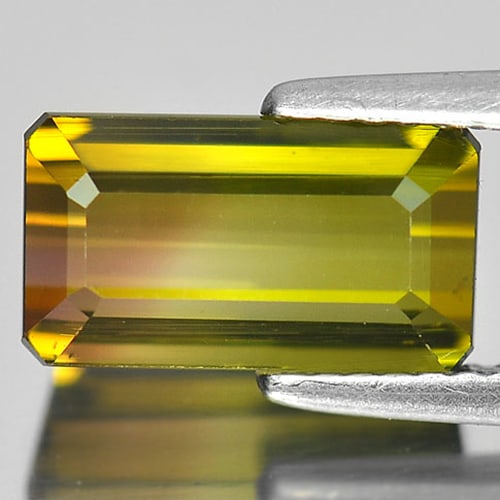 Natural Bi Color Tourmaline Gemstones 3.78 Ct. Clean Octagon Shape 11.1 x 6.2 Mm.: Product ID: 807234276 Product Name: Natural Tourmaline Weight: 3.78 CT. Size: 11.1 x 6.2 x 5.4 MM. Shape: Octagon Color: Bi Color Clarity:IF Luster: Good Gems Origin: Nigeria Treatment: Unheated Cryst