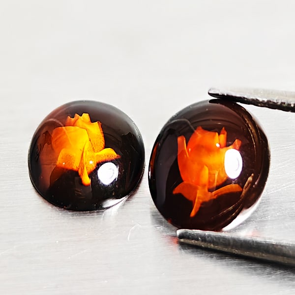 Natural Flower Carving In Brown Yellow Amber Gemstones 1.02 Ct. 2 Pcs.: Product ID: 819090993 Product Name: Natural Amber Weight: 1.02 CT. Size: 8.8 x 7.4 x 2.7 MM. Shape: Oval Cabochon Color: Brown Yellow Clarity:Semi - Transparent Luster: Good Gems Origin: Poland Treatm