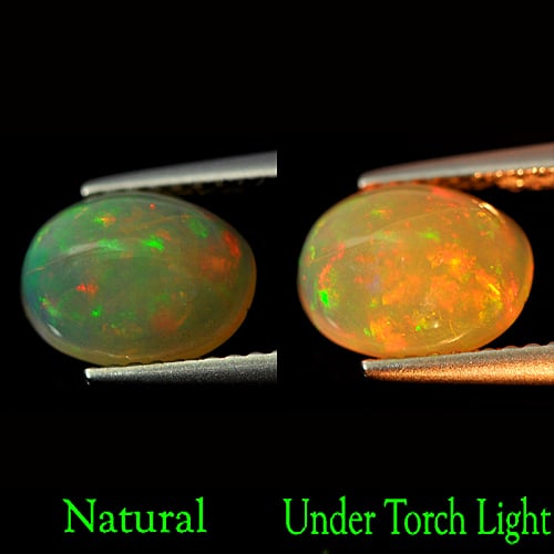 Natural Multi Color Opal Gemstone 1.21 Ct. Oval Cabochon Shape 9 x 6.9 Mm.: Product ID: 818727044 Product Name: Natural Opal Weight: 1.21 CT. Size: 9 x 6.9 x 4.2 MM. Shape: Oval Cabochon Color: Multi-Color Clarity:Semi - Transparent Luster: Iridescent Gems Origin: Ethiopia Tr
