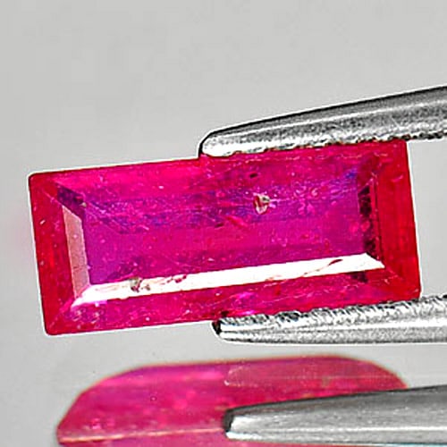 Natural Pink Ruby Gemstones 1.44 Ct. Baguette Shape 9.8 x 4.2Mm.: Product ID: 805920706 Product Name: Natural Ruby Weight: 1.44 CT. Size: 9.8 x 4.2 x 2.6 MM. Shape: Baguette Color: Purplish Pink Clarity:VSI Luster: Good Gems Origin: Mozambique Treatment: Heated (Lea