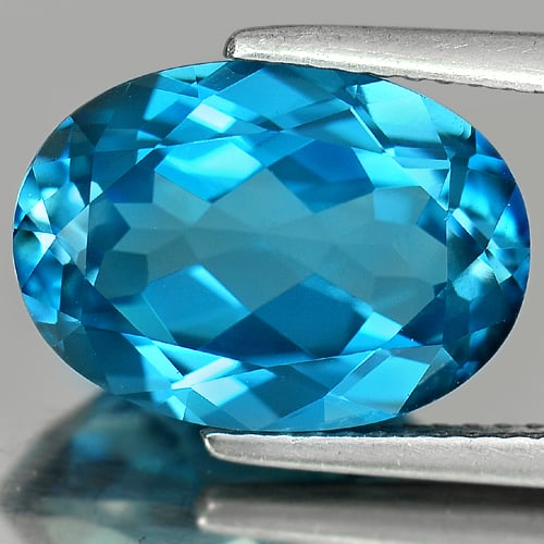 Natural London Blue Topaz Gemstones 7.56 Ct. VVS Oval Shape 14.2 x 6.5 Mm.: Product ID: 807165597 Product Name: Natural Blue Topaz Weight: 7.56 CT. Size: 14.2 x 10.2 x 6.5 MM. Shape: Oval Color: Blue Clarity:VVS Luster: Very Good Gems Origin: Brazil Treatment: Treated Crystal
