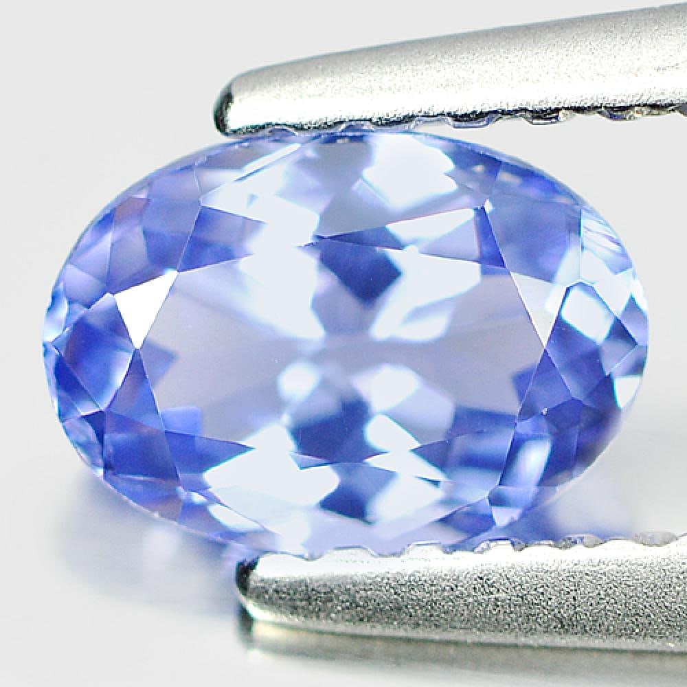 Natural Blue Tanzanite Gemstones 0.70 Ct. Clean Oval Shape 6.7 x 4.8 Mm.: Product ID: 807004592 Product Name: Natural Tanzanite Weight: 0.70 CT. Size: 6.7 x 4.8 x 3.1 MM. Shape: Oval Color: Blue Clarity:IF Luster: Very Good Gems Origin: Tanzania Treatment: Heated Crystal St