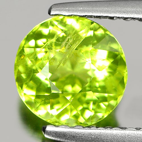 Natural Green Peridot Gemstones 1.24 Ct. Round Shape 6.5 Mm.: Product ID: 805303983 Product Name: Natural Peridot Weight: 1.24 CT. Size: 6.5 x 6.5 x 4.4 MM. Shape: Round Color: Green Clarity:SI Luster: Good Gems Origin: Thailand Treatment: Unheated Crystal Struc