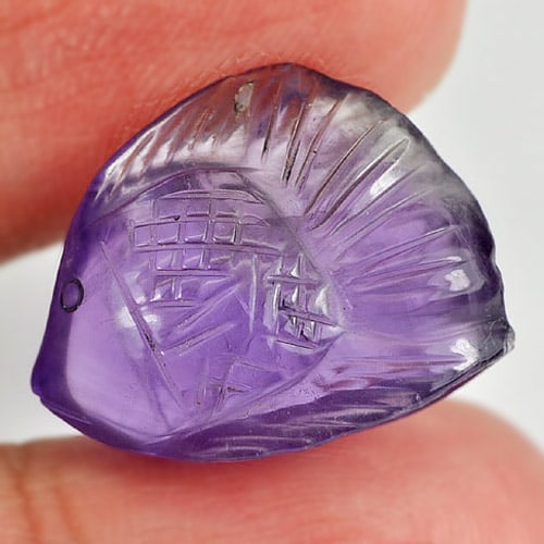 Natural Violet Amethyst Gemstones 14.16 Ct. Fish Carving 20 x 15.7 Mm.: Product ID: 810303435 Product Name: Natural Amethyst Weight: 14.16 CT. Size: 20 x 15.7 x 8.4 MM. Shape: Fish Carving Color: Violet Clarity:Semi - Transparent Luster: Good Gems Origin: Brazil Treatment