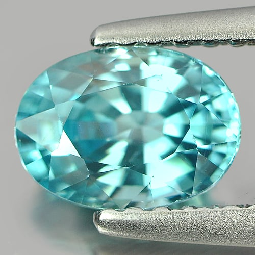 Natural Blue Zircon Gemstones 1.41 Ct. Clean Oval Shape 7 x 5.2 Mm.: Product ID: 807711020 Product Name: Natural Zircon Weight: 1.41 CT. Size: 7 x 5.2 x 3.9 MM. Shape: Oval Color: Blue Clarity:VSI Luster: Good Gems Origin: Cambodia Treatment: Heated Crystal Structure: 
