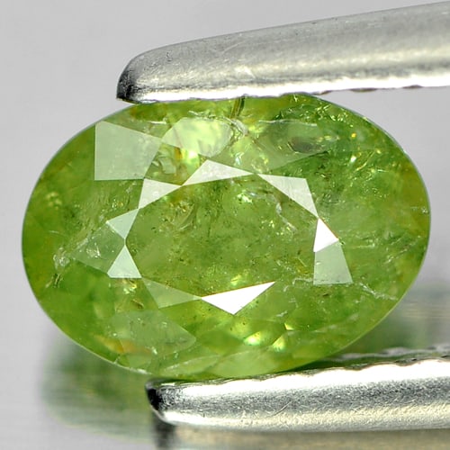 Natural Green Demantoid Garnet Gemstones 1.14 Ct. Oval Shape 7.3 x 5.2 Mm.: Product ID: 802919267 Product Name: Natural Demantoid Weight: 1.14 CT. Size: 7.3 x 5.2 x 3.8 MM. Shape: Oval Color: Green Clarity:SI Luster: Good Gems Origin: Madagascar , Africa Treatment: Unheated C