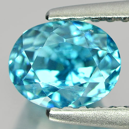 Natural Blue Zircon Gemstones 1.91 Ct. Oval Shape 6.5 x 5.1 Mm.: Product ID: 807712251 Product Name: Natural Zircon Weight: 1.91 CT. Size: 6.5 x 5.1 x 5.5 MM. Shape: Oval Color: Blue Clarity:SI1 Luster: Very Good Gems Origin: Cambodia Treatment: Heated Crystal Stru