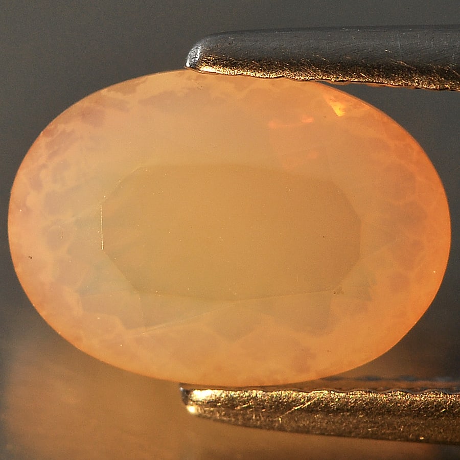 Natural Multi Color Opal Gemstones 1.44 Ct. Oval Shape 10.1 x 7.3 Mm.: Product ID: 818707417 Product Name: Natural Opal Weight: 1.44 CT. Size: 10.1 x 7.3 x 4.8 MM. Shape: Oval Color: Multi Color Clarity:Opaque Luster: Good Gems Origin: Ethiopia Treatment: Unheated Crysta