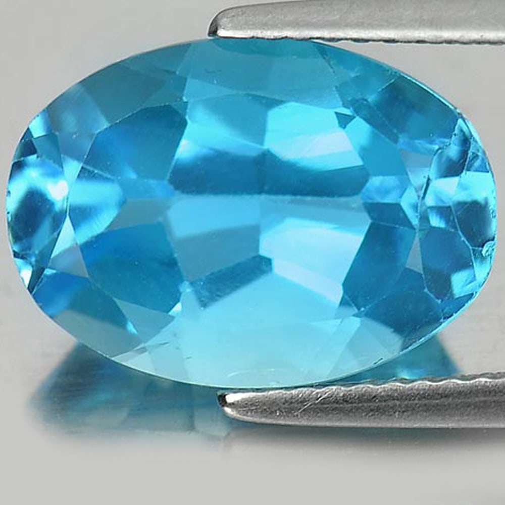 Natural Swiss Blue Topaz Gemstones 7.71 Ct. Oval Shape 14 x 10 Mm.: Product ID: 807160776 Product Name: Natural Blue Topaz Weight: 7.71 CT. Size: 14 x 10 x 7.3 MM. Shape: Oval Color: Blue Clarity:VSI Luster: Good Gems Origin: Brazil Treatment: Treated Crystal Structur
