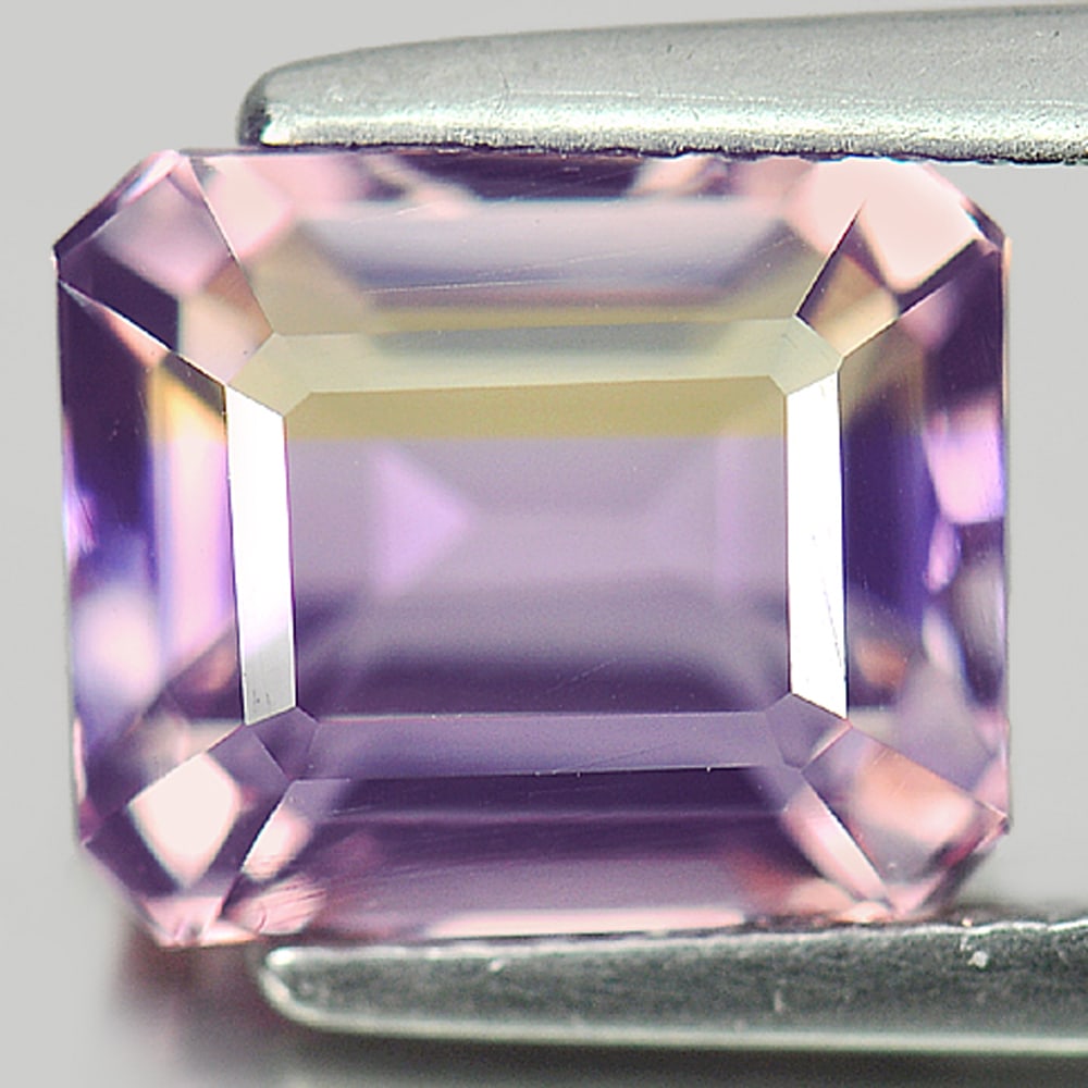 Natural Bi Color Ametrine Gemstones 4.17 Ct. Octagon Shape 9.8 x 8.2 Mm.: Product ID: 800405013 Product Name: Natural Ametrine Weight: 4.17 CT. Size: 9.8 x 8.2 x 6.6 MM. Shape: Octagon Color: Bi Color Clarity:VVS Luster: Good Gems Origin: Bolivia Treatment: Unheated Crystal