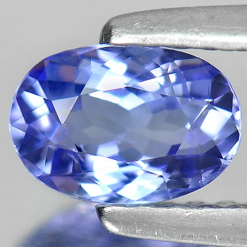 Natural Blue Tanzanite Gemstones 0.60 Ct. Clean Oval Shape 6.4 x 4.4 Mm.: Product ID: 807004747 Product Name: Natural Tanzanite Weight: 0.60 CT. Size: 6.4 x 4.4 x 3 MM. Shape: Oval Color: Violet Blue Clarity:IF Luster: Good Gems Origin: Tanzania Treatment: Heated Crystal St
