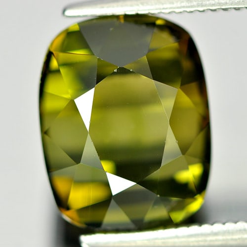 Natural Lime Green Tourmaline Gemstones 6.32 Ct. Clean Cushion Shape 11.7 x 8.7 Mm.: Product ID: 807232471 Product Name: Natural Tourmaline Weight: 6.32 CT. Size: 11.7 x 8.7 x 7.9 MM. Shape: Cushion Color: Lime Green Clarity:IF Luster: Good Gems Origin: Nigeria Treatment: Unheated Cry