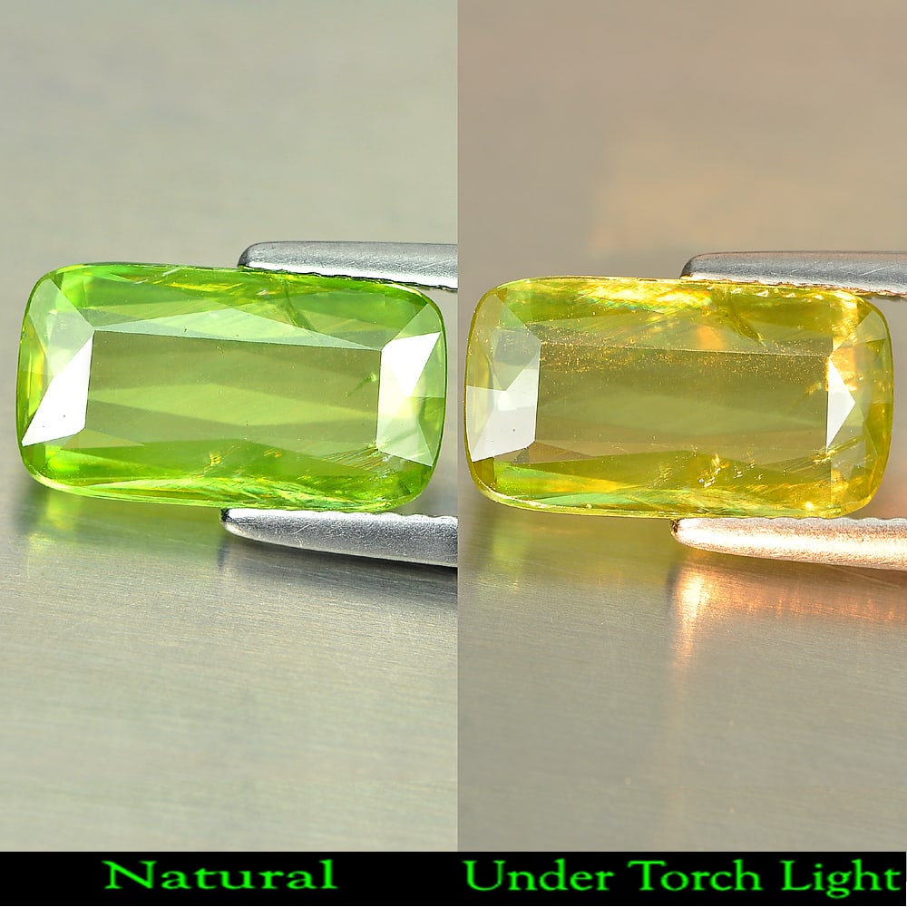 Natural Greenish Yellow Sphene Gemstones 2.79 Ct. Cushion 12.8 x 7.2 Mm.: Product ID: 806507751 Product Name: Natural Sphene Weight: 2.79 CT. Size: 12.8 x 7.2 x 2.7 MM. Shape: Cushion Color: Yellow With Rainbow Spark Clarity:VSI Luster: Good Gems Origin: Madagascar Treatmen
