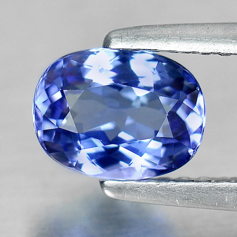Natural Blue Tanzanite Gemstones 1.17 Ct. Clean Oval Shape 7.28 x 5.53 Mm.: Product ID: 807004204 Product Name: Natural Tanzanite Weight: 1.17 CT. Size: 7.28 x 5.53 x 3.77 MM. Shape: Oval Color: Violetish Blue Clarity:IF Luster: Very Good Gems Origin: Tanzania Treatment: Heat