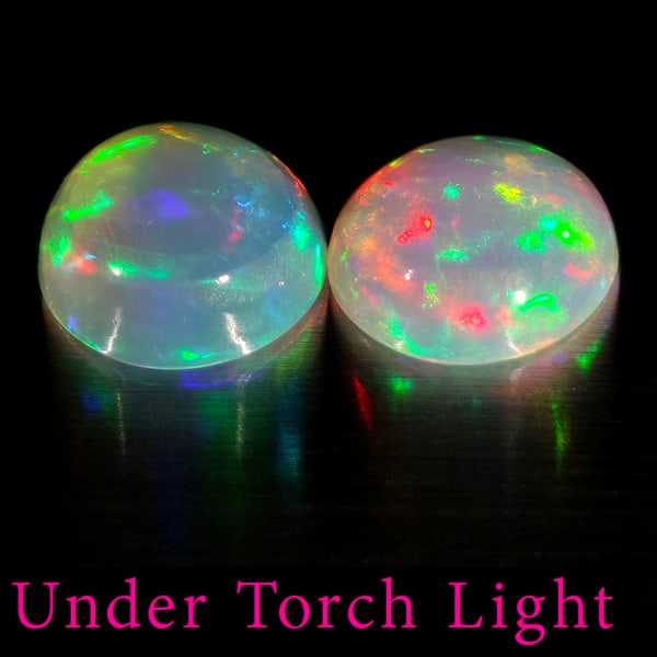 Natural Multi Color Opal Gemstones 1.61 Ct. 2 Pcs. Round Cabochon Shape 7 Mm.: Product ID: 818728165 Product Name: Natural Opal Weight: 1.61 CT. Size: 7 x 7 x 3.6 MM. Shape: Round Color: Multi-Color Clarity:Semi - Transparent Luster: Good Gems Origin: Ethiopia Treatment: Unheate