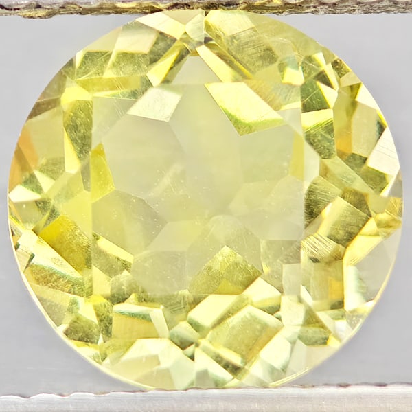 Natural Yellow Lemon Quartz Gemstones 2.59 Ct. Round Shape 9.1 Mm.: Product ID: 805530105 Product Name: Natural Quartz Weight: 2.59 CT. Size: 9.1 x 9.1 x 5.8 MM. Shape: Round Color: Yellow Lemon Clarity:VSI Luster: Good Gems Origin: Brazil Treatment: Unheated Crystal 