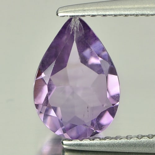 Natural Purple Amethyst Gemstones 1.27 Ct. Pear Shape 9.8 x 6.9 Mm.: Product ID: 800313774 Product Name: Natural Amethyst Weight: 1.27 CT. Size: 9.8 x 6.9 x 3.7 MM. Shape: Pear Color: Purple Clarity:VVS - VSI Luster: Good Gems Origin: Brazil Treatment: Unheated Crystal