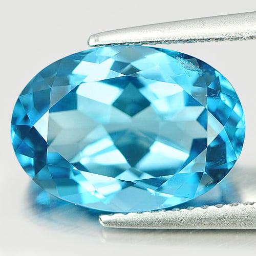 Natural London Blue Topaz Gemstones 7.11 Ct. Oval Shape 13.8 x 9.8 Mm.: Product ID: 807165600 Product Name: Natural Blue Topaz Weight: 7.11 CT. Size: 13.8 x 9.8 x 6.6 MM. Shape: Oval Color: Blue Clarity:VSI Luster: Very Good Gems Origin: Brazil Treatment: Treated Crystal 
