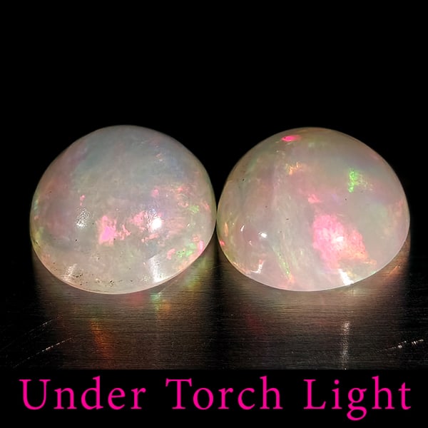 Natural Multi Color Opal Gemstones 1.76 Ct. 2 Pcs Round Cabochon Shape 6.9 Mm.: Product ID: 818728225 Product Name: Natural Opal Weight: 1.76 CT. Size: 6.9 x 6.9 x 4 MM. Shape: Round Color: Multi-Color Clarity:Semi - Transparent Luster: Good Gems Origin: Ethiopia Treatment: Unhea