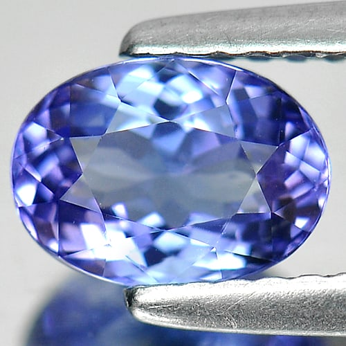 Natural Blue Tanzanite Gemstones 1.07 Ct. Clean Oval Shape 7.2 x 5.2 Mm.: Product ID: 807004460 Product Name: Natural Tanzanite Weight: 1.07 CT. Size: 7.2 x 5.2 x 3.9 MM. Shape: Oval Color: Blue Clarity:IF Luster: Very Good Gems Origin: Tanzania Treatment: Heated Crystal St