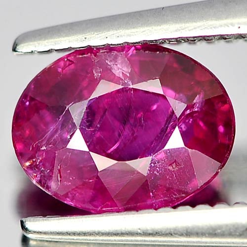 Natural Unheated Purplish Pink Ruby Gemstones 1.15 Ct. Oval Shape 7.2 x 5.6 Mm.: Product ID: 805921014 Product Name: Natural Ruby Weight: 1.15 CT. Size: 7.2 x 5.6 x 3.1 MM. Shape: Oval Color: Purplish Pink Clarity:VSI Luster: Good Gems Origin: Tanzania Treatment: Unheated Crystal 