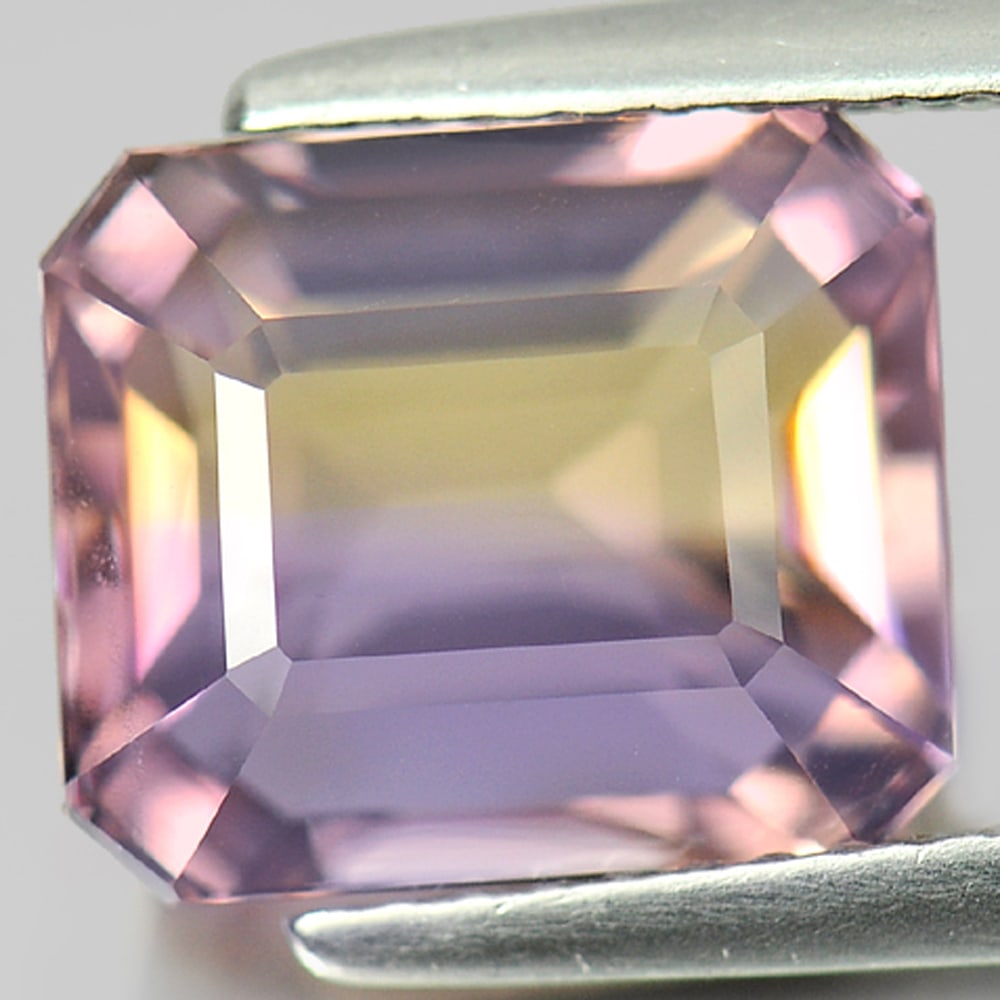 Natural Bi Color Ametrine Gemstones 4.52 Ct. VVS Octagon Shape 10.2 x 8.7 Mm.: Product ID: 800404975 Product Name: Natural Ametrine Weight: 4.52 CT. Size: 10.2 x 8.7 x 6.5 MM. Shape: Octagon Color: Bi Color Clarity:VVS Luster: Good Gems Origin: Bolivia Treatment: Unheated Crysta