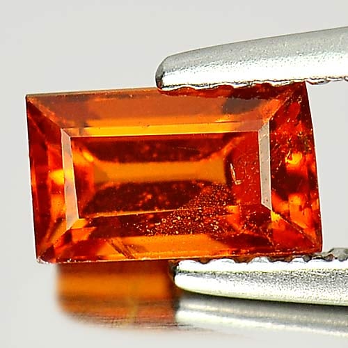 Natural Reddish Orange Spessartine Garnet Gemstones 1.08 Ct. Baguette Shape 6.4 x 3.9 Mm.: Product ID: 802922789 Product Name: Natural Spessartine Weight: 1.08 CT. Size: 6.4 x 3.9 x 3.7 MM. Shape: Baguette Color: Reddish Orange Clarity:SI1 Luster: Good Gems Origin: Nigeria Treatment: Unheat