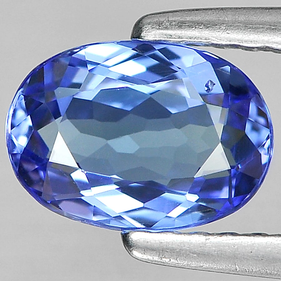 Natural Blue Tanzanite Gemstones 0.99 Ct. VVS Oval Shape 7.60 x 5.45 Mm.: Product ID: 807005758 Product Name: Natural Tanzanite Weight: 0.99 CT. Size: 7.60 x 5.45 x 2.88 MM. Shape: Oval Color: Violetish Blue Clarity:VVS Luster: Good Gems Origin: Tanzania Treatment: Heated C