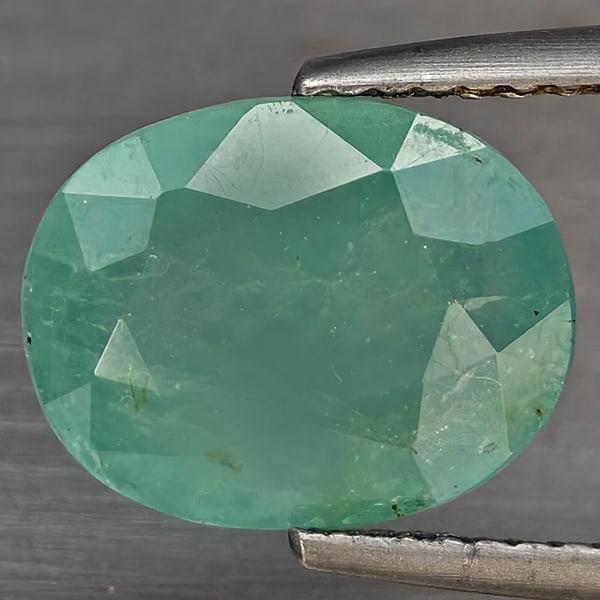 Natural Green Blueish Grandidierite Gemstones 3.10 Ct .Oval Shape 11 x 8.6 Mm.: Product ID: 803100004 Product Name: Natural Tsavorite Weight: 3.10 CT. Size: 11 x 8.6 x 4.9 MM. Shape: Oval Shape Color: Green Blueish Clarity:SI1 Luster: Good Gems Origin: Madagascar Treatment: Unhea