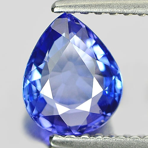 Natural Blue Tanzanite Gemstones 0.91 Ct. Clean Pear Shape 7.40 x 6.01 Mm.: Product ID: 807005981 Product Name: Natural Tanzanite Weight: 0.91 CT. Size: 7.40 x 6.01 x 2.72 MM. Shape: Pear Color: Blue Clarity:IF Luster: Very Good Gems Origin: Tanzania Treatment: Heated Crystal