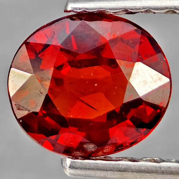 Natural Orangish Red Spessartine Garnet Gemstones 0.99 Ct. Oval Shape 6.1 x 5.5 Mm.: Product ID: 802937389 Product Name: Natural Garnet Weight: 0.99 CT. Size: 6.1 x 5.5 x 3.2 MM. Shape: Oval Shape Color: Orangish Red Clarity:SI1 Luster: Good Gems Origin: Namibia Treatment: Unheated Cr