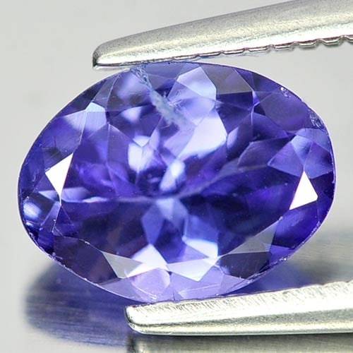 Natural Blue Tanzanite Gemstones 1.03 Ct. Oval Shape 7.8 x 5.8 Mm.: Product ID: 807009005 Product Name: Natural Tanzanite Weight: 1.03 CT. Size: 7.8 x 5.8 x 3.5 MM. Shape: Oval Color: Blue Clarity:SI Luster: Very Good Gems Origin: Tanzania Treatment: Heated Crystal St