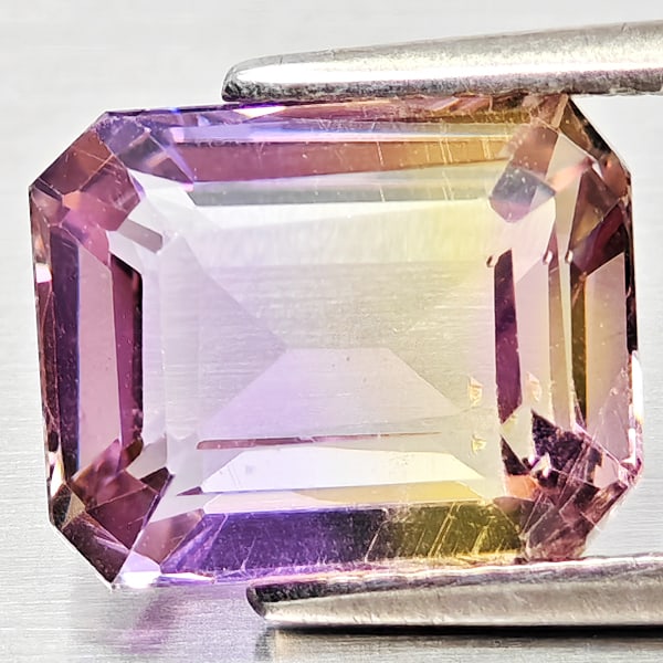 Natural Bi Color Ametrine Gemstones 3.09 Ct. Octagon Shape 9.8 x 7.8 Mm.: Product ID: 800408351 Product Name: Natural Ametrine Weight: 3.09 CT. Size: 9.8 x 7.8 x 5.3 MM. Shape: Octagon Color: Bi Color Clarity:VSI Luster: Good Gems Origin: Bolivia Treatment: Unheated Crystal