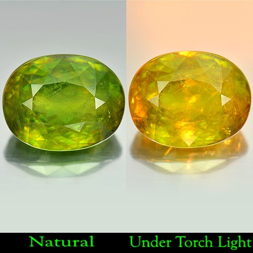 Natural Intense Green Titanium Sphene Red Spark 25.50 Ct. Oval Shape 19.4 x 15.2 Mm. (1 of 3)