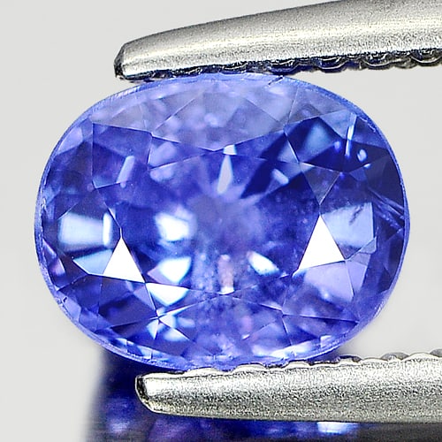 Natural Blue Tanzanite Gemstones 1.05 Ct. Oval Shape 6.6 x 5.3 Mm.: Product ID: 807005352 Product Name: Natural Tanzanite Weight: 1.05 CT. Size: 6.6 x 5.3 x 4.4 MM. Shape: Oval Color: Purple Clarity:SI Luster: Good Gems Origin: Tanzania Treatment: Heated Crystal Struc
