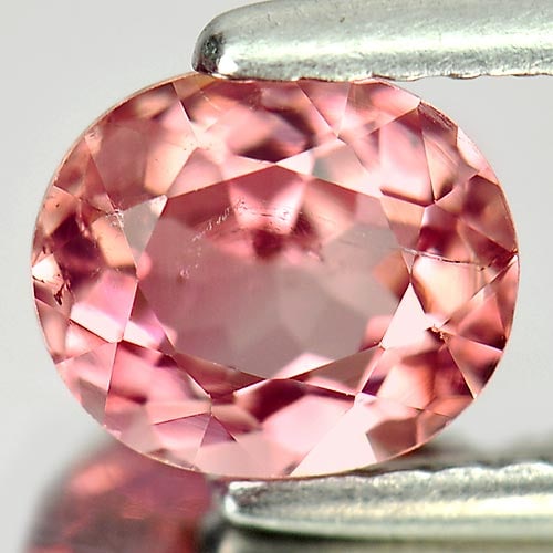 Natural Pink Tourmaline Gemstones 0.96 Ct. Oval Shape 6.6 x 5.6 Mm.: Product ID: 807245970 Product Name: Natural Tourmaline Weight: 0.96 CT. Size: 6.6 x 5.6 x 3.8 MM. Shape: Oval Color: Pink Clarity:SI1 Luster: Good Gems Origin: Nigeria Treatment: Unheated Crystal Stru