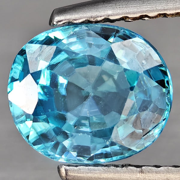 Natural Blue Zircon Gemstones 2.16 Ct. Clean Oval Shape 7.4 x 6.3 Mm.: Product ID: 807743066 Product Name: Natural Zircon Weight: 2.16 CT. Size: 7.4 x 6.3 x 4.1 MM. Shape: Oval Color: Blue Clarity:VSI Luster: Good Gems Origin: Cambodia Treatment: Heated Crystal Structure