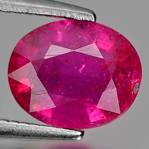 Natural Purplish Pink Ruby Gemstones 1.64 Ct. Oval Shape 7.8 x 6.3 Mm.: Product ID: 805920211 Product Name: Natural Ruby Weight: 1.64 CT. Size: 7.8 x 6.3 x 3.4 MM. Shape: Oval Color: Purplish Pink Clarity:VSI Luster: Good Gems Origin: Mozambique Treatment: Heated (Lead-gl