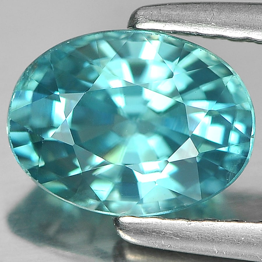 Natural Blue Zircon Gemstones 1.89 Ct. VVS Oval Shape 7.9 x 5.9 Mm.: Product ID: 807717282 Product Name: Natural Zircon Weight: 1.89 CT. Size: 7.9 x 5.9 x 4.3 MM. Shape: Oval Color: Blue Clarity:VVS Luster: Good Gems Origin: Cambodia Treatment: Heated Crystal Structure