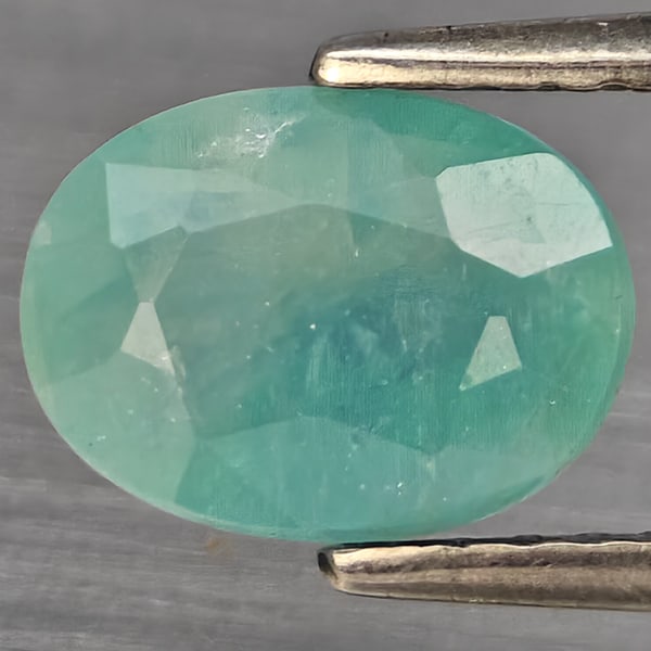 Natural Green Blueish Grandidierite Gemstones 1.63 Ct. Oval Shape 8.2 x 6.2 Mm.: Product ID: 803100039 Product Name: Natural Tsavorite Weight: 1.63 CT. Size: 8.2 x 6.2 x 5.2 MM. Shape: Oval Shape Color: Green Blueish Clarity:SI1 Luster: Good Gems Origin: Madagascar Treatment: Unhe