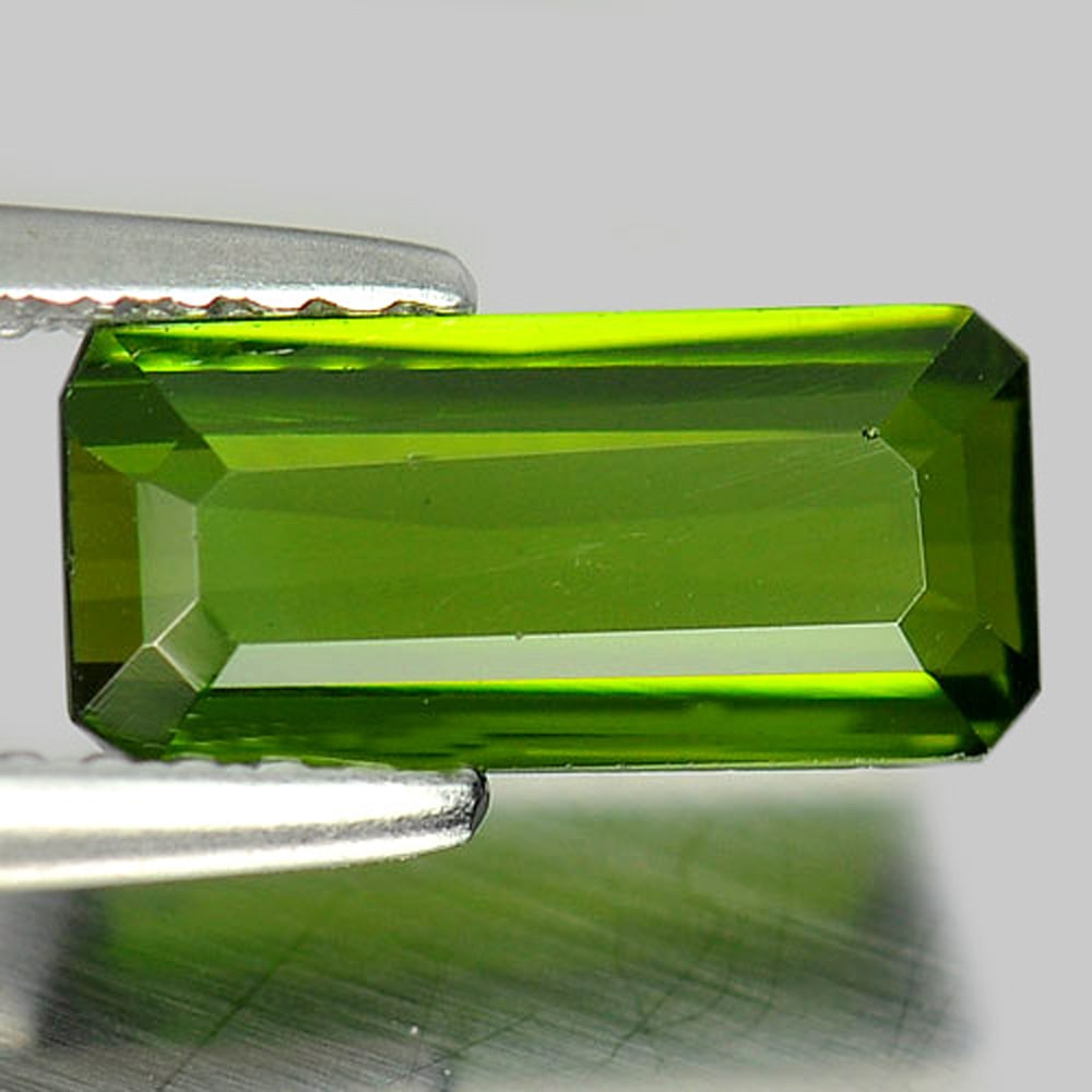 Natural Green Tourmaline Gemstones 1.15 Ct. VVS Octagon Shape 9.5 x 4.5 Mm.: Product ID: 807244713 Product Name: Natural Tourmaline Weight: 1.15 CT. Size: 9.5 x 4.5 x 2.7 MM. Shape: Octagon Color: Green Clarity:VVS Luster: Good Gems Origin: Nigeria Treatment: Unheated Crystal 