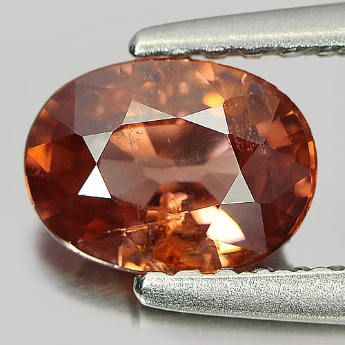 Natural Imperial Zircon Gemstone 1.00 Ct. Oval Shape 6.7 x 5 Mm.: Product ID: 807725907 Product Name: Natural Zircon Weight: 1.00 CT. Size: 6.7 x 5 x 2.9 MM. Shape: Oval Color: Imperial Clarity:SI Luster: Good Gems Origin: Cambodia Treatment: Heated Crystal Structur