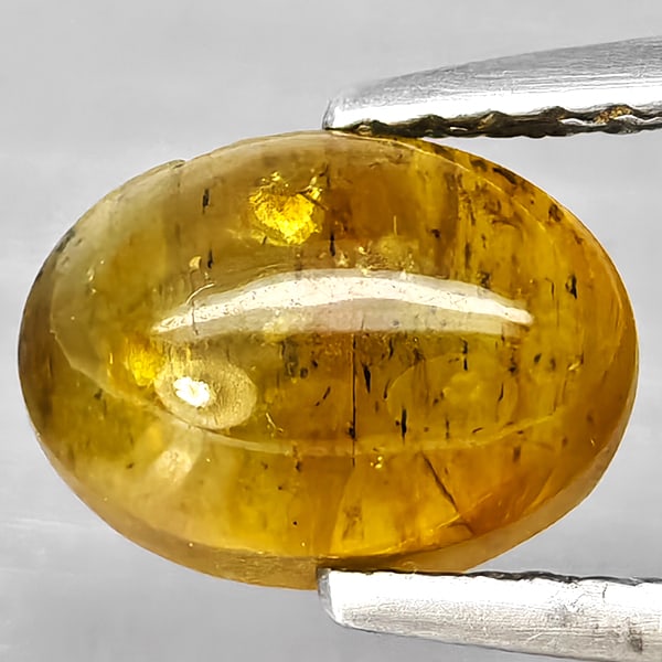 Natural Yellowish Green Cats Eye Apatite Gemstones 2.86 Ct. Oval Cabochon Shape 8.6 x 6.2 Mm.: Product ID: 800613808 Product Name: Natural Apatite Weight: 2.86 CT. Size: 8.6 x 6.2 x 5.9 MM. Shape: Oval Cabochon Color: Yellowish Green Clarity:Semi - Transparent Luster: Good Gems Origin: Tanzania