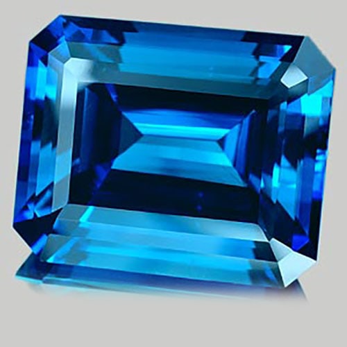 Natural London Blue Topaz 185.60 Ct. Clean Octagon Shape 36.61 x 30.24 Mm.: Product ID: 807136903 Product Name: Natural Blue Topaz Weight: 185.60 CT. Size: 36.61 x 30.24 x 19.34 MM. Shape: Octagon Color: London Blue Clarity:IF Luster: Very Good Gems Origin: Brazil Treatment: 