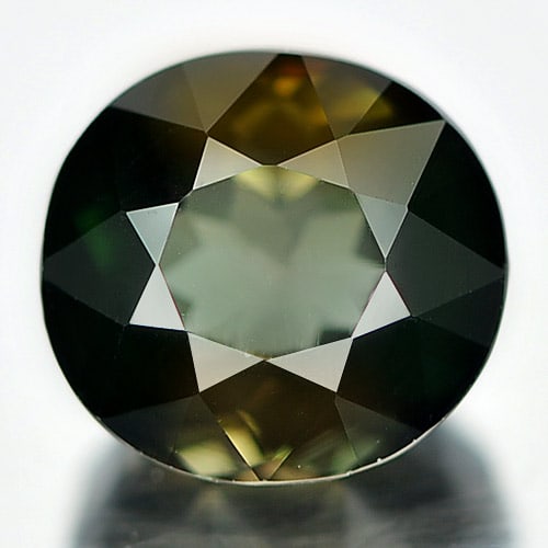 Natural Brownish Green Tourmaline Gemstones 1.77 Ct. VVS Oval Shape 7.4 x 7 Mm.: Product ID: 807244052 Product Name: Natural Tourmaline Weight: 1.77 CT. Size: 7.4 x 7 x 5.2 MM. Shape: Oval Color: Brownish Green Clarity:VVS Luster: Good Gems Origin: Nigeria Treatment: Unheated Crys